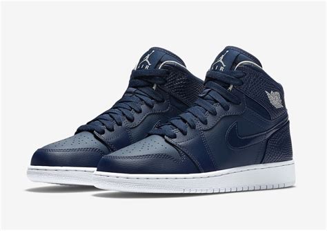 navy blue high top jordans